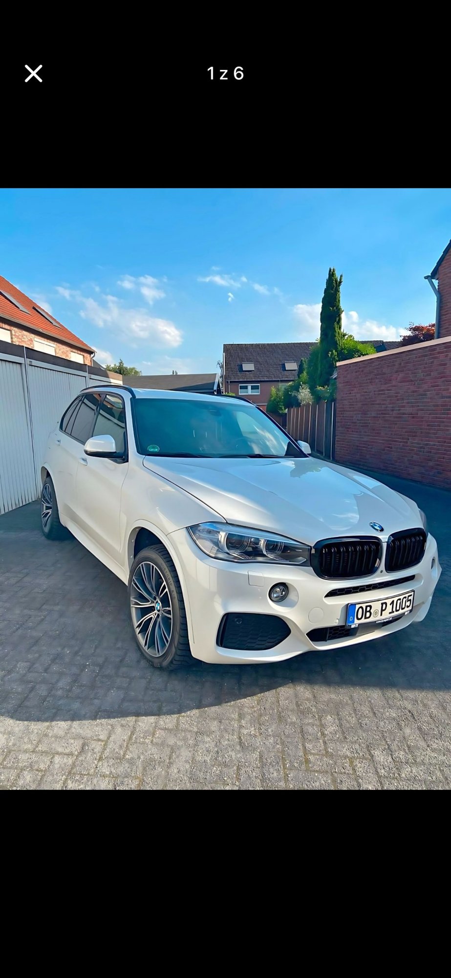 Numer rejestracyjny OBP1005 posiada BMW X5