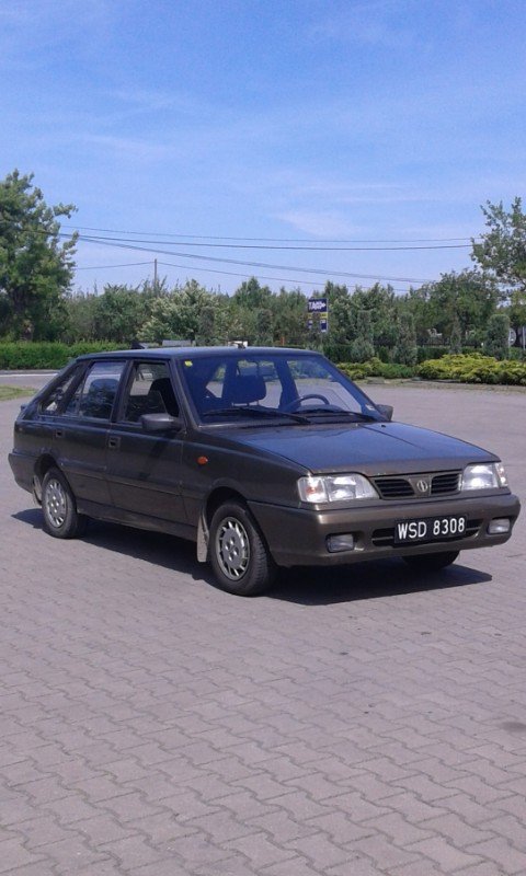 Numer rejestracyjny WSD8308 posiada Proton Saga