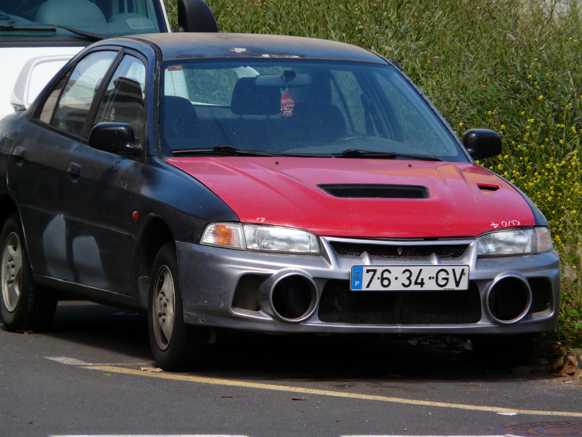 Numer rejestracyjny 7634GV posiada Mitsubishi Lancer